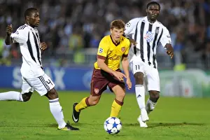 Andrey Arshavin (Arsenal) Medo and Pierre Boya (Partizan). Partizan Belgrade 1: 3 Arsenal