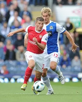 Images Dated 28th August 2010: Andrey Arshavin (Arsenal) Morten Gamst Pedersen (Blackburn). Blackburn Rovers 1: 2 Arsenal