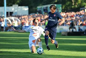 Andrey Arshavin (Arsenal) Roman Flandorfer (SC Columbia)