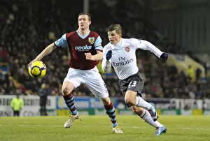 Burnley V Arsenal 2009-10 Prints: Andrey Arshavin (Arsenal) Steven Caldwell (Burnley). Burnley 1: 1 Arsenal