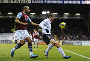 Andrey Arshavin (Arsenal) Tyrone Mears (Burnley). Burnley 1:1 Arsenal, Barclays Premier League Andrey Arshavin (Arsenal) Tyrone Mears (Burnley). Burnley 1:1 Arsenal, Barclays Premier League