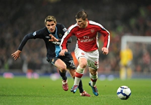 Andrey Arshavin (Arsenal) Valon Behrami (West Ham). Arsenal 2:0 West Ham United Andrey Arshavin (Arsenal) Valon Behrami (West Ham). Arsenal 2:0 West Ham United