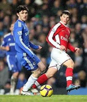 Images Dated 7th February 2010: Andrey Arshavin (Arsenal) Yury Zhirkov (Chelsea). Chelsea 2: 0 Arsenal. Barclays Premier League