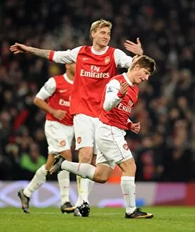 Andrey Arshavin celebrates scoring the 1st Arsenal goal with Nicklas Bendtner