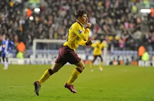 Andrey Arshavin celebrates scoring the 1st Arsenal goal. Wigan Athletic 2: 2 Arsenal