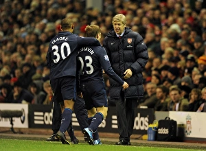 Liverpool v Arsenal 2009-10 Gallery: Andrey Arshavin celebrates scoring the 2nd Arsenal goal with Armand Traore