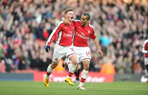 Andrey Arshavin celebrates scoring the 3rd Arsenal goal with Theo Walcott