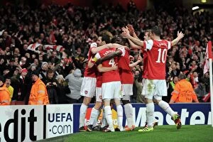 Images Dated 16th February 2011: Andrey Arshavin celebrates scoring Arsenals 2nd goal with his team mates