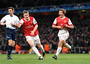 Andrey Arshavin celebrates scoring Arsenals 2nd goal with Nicklas Bendtner