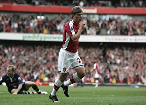 Arshavin Andrey Collection: Andrey Arshavin celebrates scoring Arsenals 3rd goal