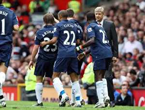Andrey Arshavin celebrates scoring Arsenals goal with Gael Clichy