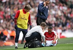 Arsenal v Birmingham City 2009-10 Collection: Andrey Arshavin checks on Theo Walcott