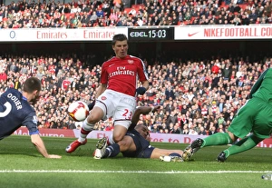 Arsenal v Blackburn Rovers 2008-9 Collection: Andrey Arshavin looks on as Andre Ooijer puts through