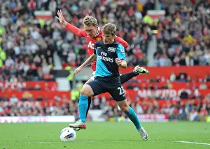 Manchester United V Arsenal 2011-12 Prints: Andrey Arshavin Outmaneuvers Phil Jones: Manchester United vs