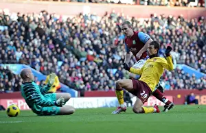 Aston Villa V Arsenal 2010-11 Prints: Andrey Arshavin scores Arsenals 1st goal past Brad Friedel under pressure from James Collins