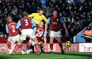 Aston Villa V Arsenal 2010-11 Prints: Andrey Arshavin scores Arsenals 1st goal under pressure from James Collins (Villa)