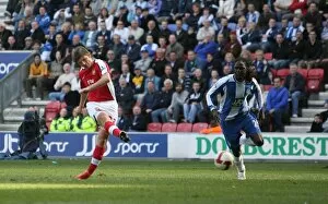 Images Dated 11th April 2009: Andrey Arshavin scores Arsenals 3rd under presure
