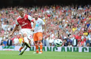Andrey Arshavin shoots past Blackpool goalkeeper Matthew Gilks from the penalty spot to score the 2nd Arsenal goal. Arsenal 6: 0 Blackpool, Barclays Premier League, Emirates Stadium, Arsenal Football Club, London, 21 / 8 / 2010. Credit : Stuart MacFarlane / Arsenal
