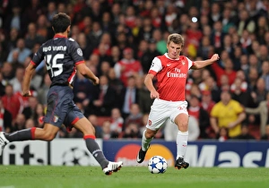 Andrey Arshavin shoots past Braga goalkeeper Felipe to score the 2nd Arsenal goal Andrey Arshavin shoots past Braga goalkeeper Felipe to score the 2nd Arsenal goal