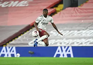 Empty Anfield: Ainsley Maitland-Niles in Action for Arsenal vs Liverpool, 2020-21 Premier League