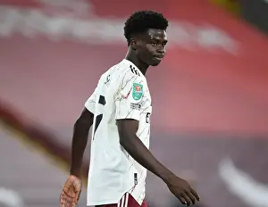 Empty Anfield Showdown: Bukayo Saka Leads Arsenal Against Liverpool in Carabao Cup Clash Amidst Pandemic