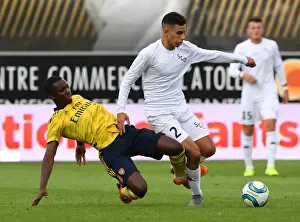 Angers SCO V Arsenal 2019-20 Prints: Angers vs Arsenal: Nketiah Clashes with Ait Nouri in Pre-Season Friendly