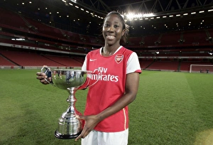 Arsenal Ladies v Chelsea 2007-8 Collection: Anita Asante (Arsenal) with the Premier League Trophy