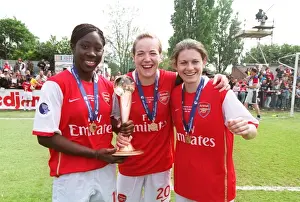 Anita Asante, Gemma Davison and Karen Carney (Arsenal) with the European Trophy