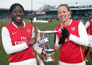 Anita Asante and Lianne Sanderson (Arsenal) with the League Cup Trophy