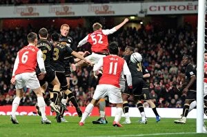 Images Dated 30th November 2010: Antolin Alcaraz (Wigan) scores an own goal for Arsenals 1st goal. Arsenal 2