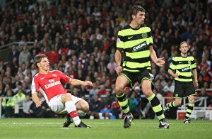 Arsenal v Celtic 2009-10 Collection: Ardrey Arshavin scores Arsenals 3rd goal past Massimo Donati