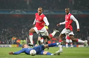 Images Dated 12th December 2007: Armand Traore and Abu Diaby (Arsenal) Dorin Goian (Bucuresti)
