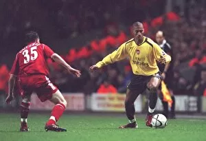 Liverpool v Arsenal - Carling Cup Collection: Armand Traore (Arsenal) Danny Guthrie (Liverpool)