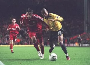 Liverpool v Arsenal - Carling Cup Collection: Armand Traore (Arsenal) Gabriel Paletta (Liverpool)