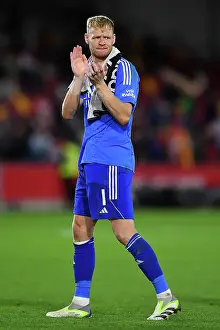 Brentford V Arsenal - Carabao Cup 2023-24 Prints: Arsenal Advance in Carabao Cup: Aaron Ramsdale Celebrates Victory over Brentford