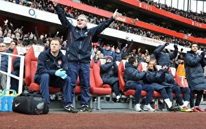 Images Dated 30th January 2011: Arsenal assistant manager Pat Rice and physio Colin Lewin. Arsenal 2: 1 Huddersfield Town