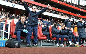 Images Dated 30th January 2011: Arsenal assistant manager Pat Rice and physio Colin Lewin. Arsenal 2: 1 Huddersfield Town