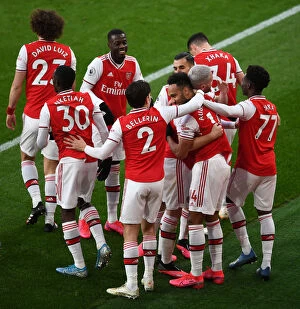 Images Dated 23rd February 2020: Arsenal: Aubameyang Scores Second Goal vs. Everton, Celebrating with Team Mates (2019-20)