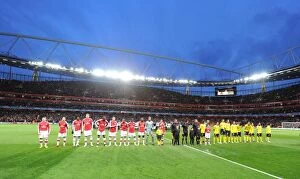 Images Dated 31st March 2010: The Arsenal and Barcelona teams line up before the match. Arsenal 2: 2 Barcelona
