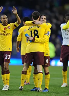 Everton V Arsenal 2010-11 Prints: Arsenal captain Cesc Fabregas celebrates after the match with Sebastien Squillaci
