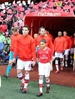 Arsenal captain Cesc Fabregas leads the team out before the match. Arsenal 1