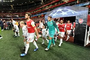 Arsenal v Shaktar Donetsk 2010 - 11 Collection: Arsenal captain Cesc Fabregas and Lucasz Fabianski. Arsenal 5: 1 Shakhtar Donetsk
