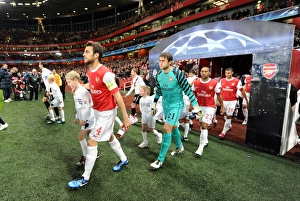 Arsenal v Shaktar Donetsk 2010 - 11 Collection: Arsenal captain Cesc Fabregas and Lucasz Fabianski. Arsenal 5: 1 Shakhtar Donetsk