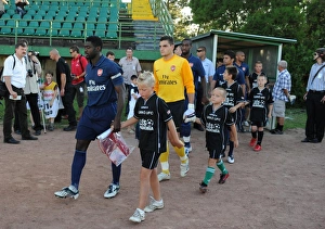 Szombathelyi Haladas v Arsenal 2009-10 Collection: Arsenal captain Kolo Toure leads out the team before the match