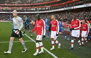 Arsenal v Portsmouth 2008-09 Collection: Arsenal captain Manuel Almunia leads out the team