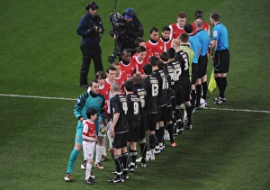 Arsenal captain Manuel Almunia leads out the team. Arsenal 5: 0 Leyton Orient