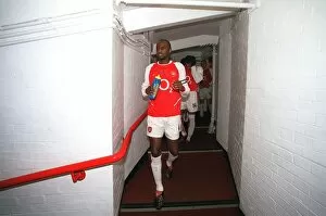 Images Dated 21st September 2005: Arsenal captain Patrick Vieira leads the team out for the match