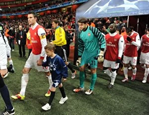 Arsenal captain Robin van Persie leads out the team. Arsenal 3: 1 Partizan Belgrade