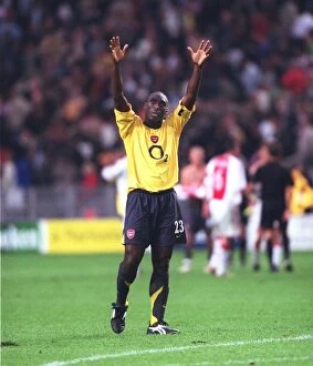 Ajax v Arsenal - Champions League 2005-6 Collection: Arsenal captain Sol Campbell celebrates after the match