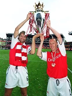 Arsenal captain Tony Adams and Lee Dixon lift the F.A
